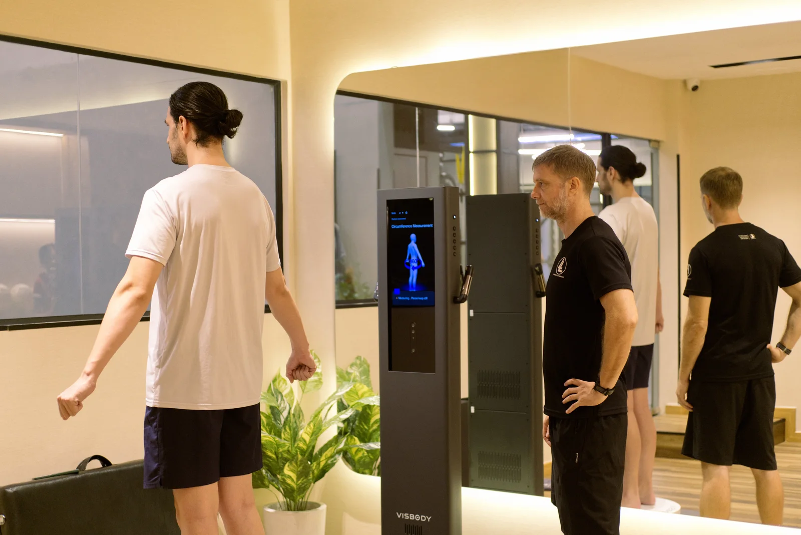 Client using the Visbody 3D body composition scanner at LLFitness